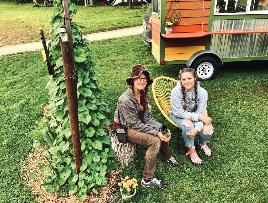 Marnie Hofmeister-Pooley with her daughter in front of the Let's Shine Coffee Cart